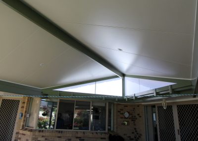 Insulated patio roof with downlights