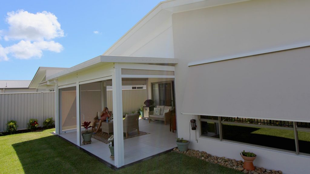 The backyard after the installation of X Channel Awnings