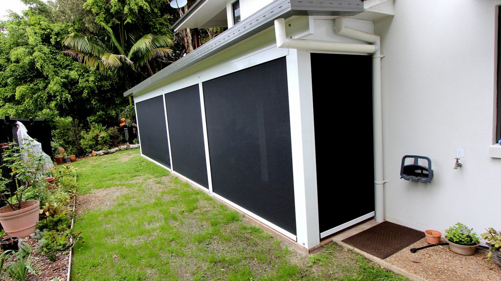External view of the patio area showing the insulated patio roof extersion and the zip screen blinds